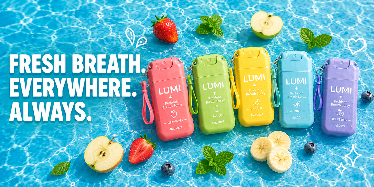 Five LUMI Probiotic Breath Spray bottles — strawberry, apple, banana, mint and blueberry — floating in blue pool water with fresh fruit, next to the words Fresh Breath. Everywhere. Always.